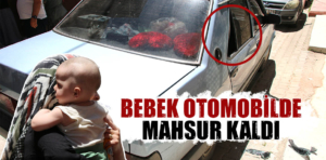 Kütahya’da otomobilde mahsur kalan bebek kurtarıldı